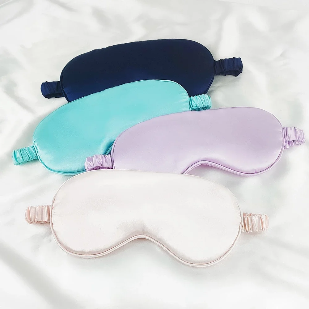 Satin sleep masks in navy, mint, lilac and white
